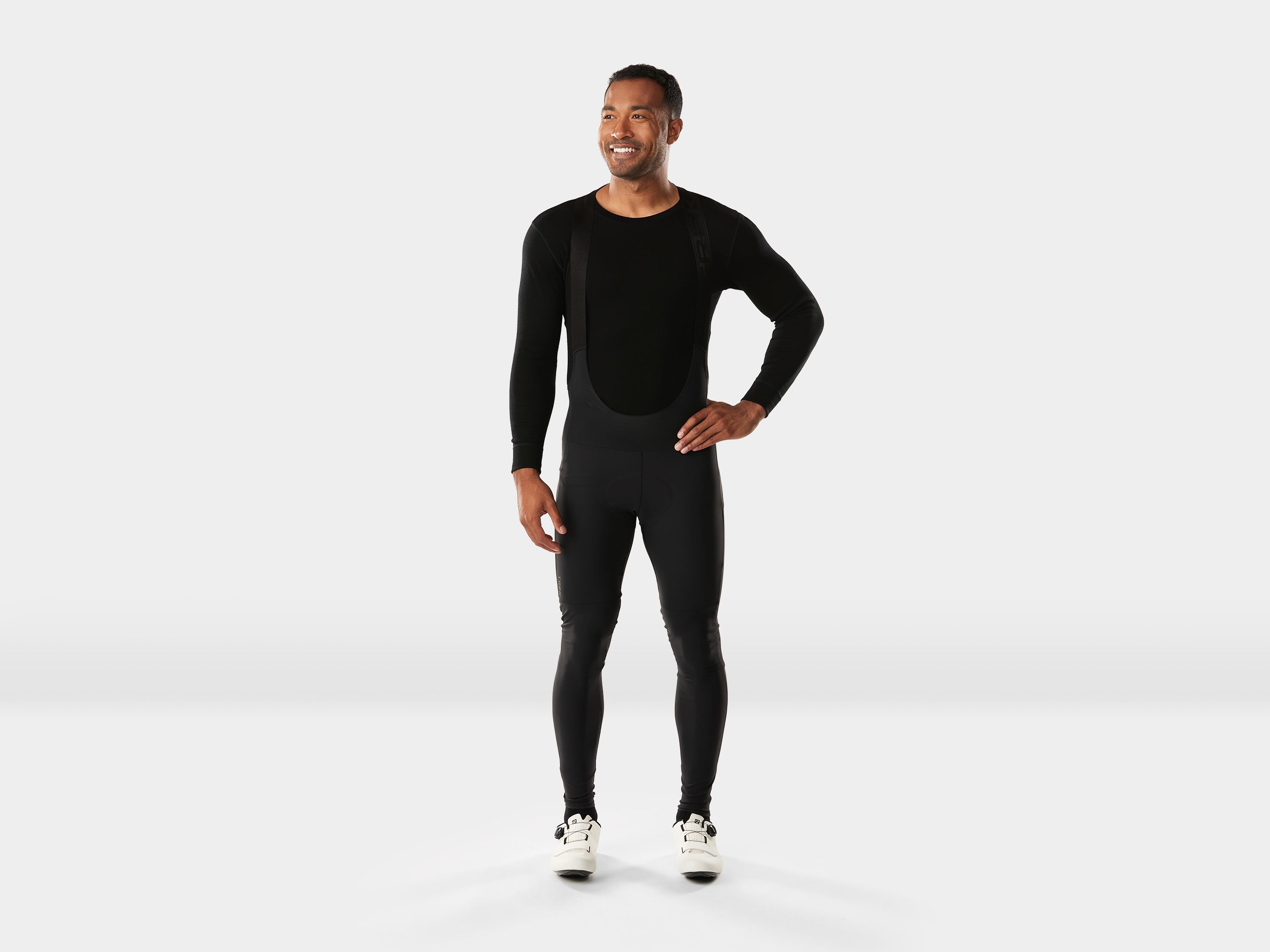 Trek Circuit Thermal Cycling Bib Tight Longs in black, padded and warm, designed for cold weather rides, showing the fitted long cycling gear