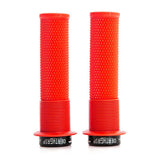 Red DMR Brendog Deathgrip flange mountain bike handlebar grips with thin design and textured surface for improved grip and control.