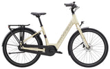 Trek District+ 1 Lowstep women's 2025 e-hybrid bike for urban commuting, shown in a city street setting.