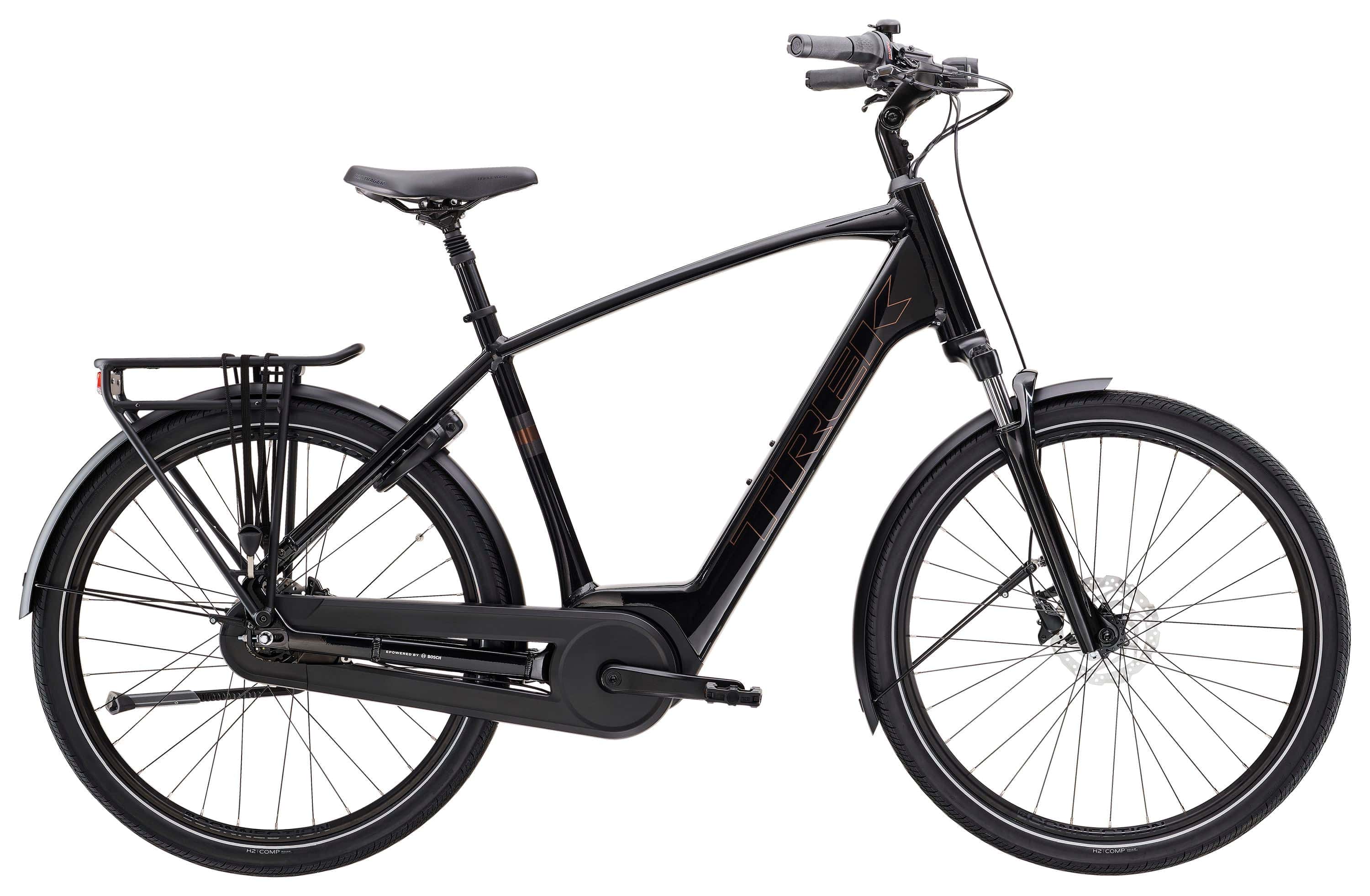 Trek District+ 2 unisex electric hybrid bike for urban commuting and suburban riding, shown in a city setting.