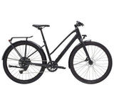 Trek Dual Sport 2 Stagger hybrid bike for women, equipped for commuting and trail riding, with a lightweight frame and versatile tires.