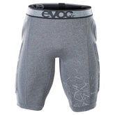 EVOC Crash Pants with integrated hip and thigh protection for active riders, showing durable motorcycle riding gear.