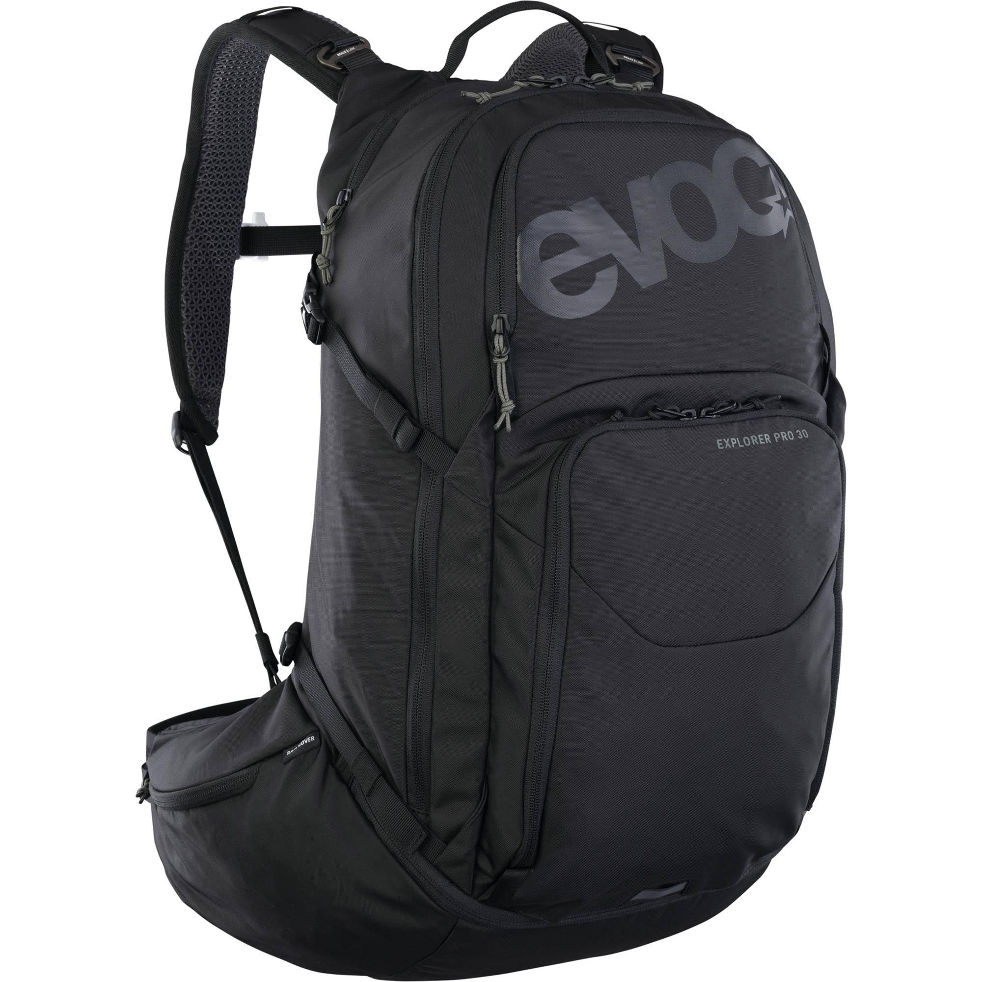 EVOC Explorer Pro 30L cycling backpack with hydration reservoir and helmet holder, designed for performance cycling accessories.