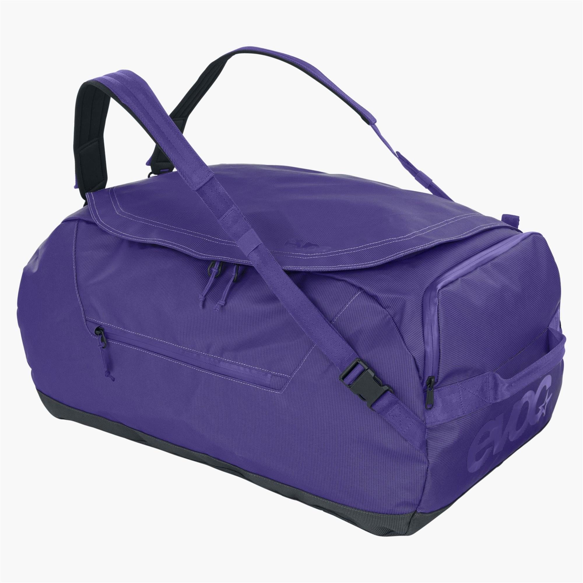 EVOC 60L Duffle Bag showing durable black fabric, zipper closure, carrying handles, and compact design for travel and accessories.