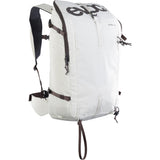 EVOC Summit 30 ski touring backpack with avalanche gear storage and hydration compatibility, shown with gear and straps.