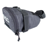 EVOC Seat Bag Tour 0.7L water-repellent saddlebag with reflective print and backlight loop for cycling accessories.