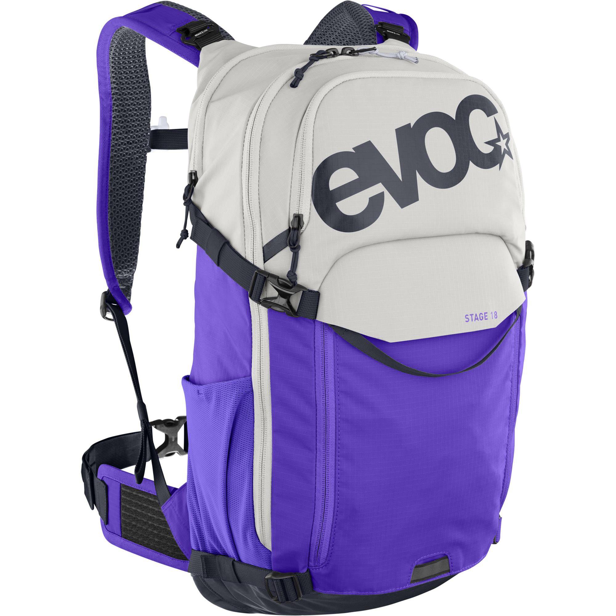 EVOC Stage 18 MTB backpack in sand and violet with hydration system and helmet holder, designed for mountain biking.