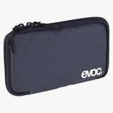 EVOC travel case with organizer pockets and water-repellent fabric for storing documents and accessories.