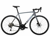 Lightweight Trek Emonda ALR 5 road racing bike with sleek frame and advanced components, designed for high-performance cycling.