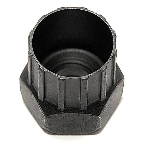 Fat Spanner Shimano freewheel remover tool for bike maintenance, shown in a workshop setting, used for removing bicycle freewheels.