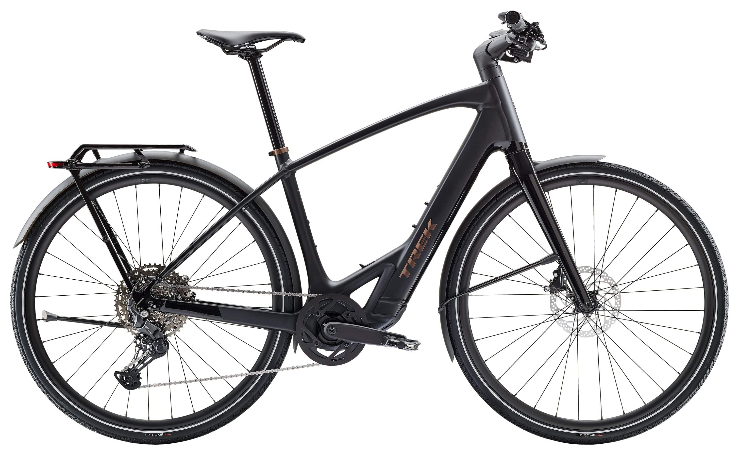 Trek FX+ 7 2025 e-hybrid bike with Shimano CUES U6000 system and disc brakes, side view showing frame and wheels.