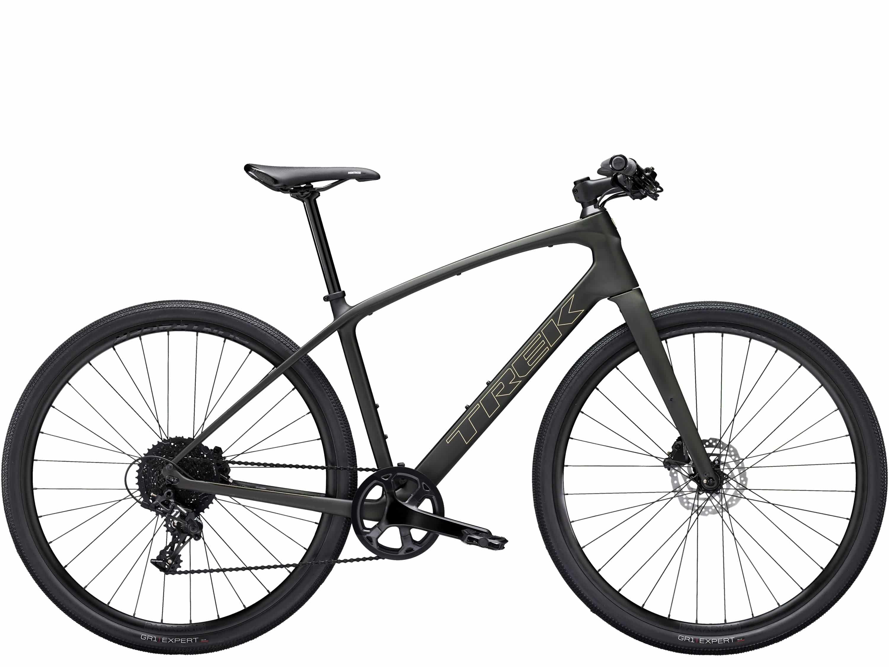 Trek FX Sport 5 hybrid bike with carbon frame, SRAM Apex drivetrain, and hydraulic disc brakes on smooth road.