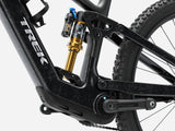 Trek Fuel+ EX 9.8 XT Gen 2 electric mountain bike with black frame, suspension, and knobby tires, ready for off-road riding.