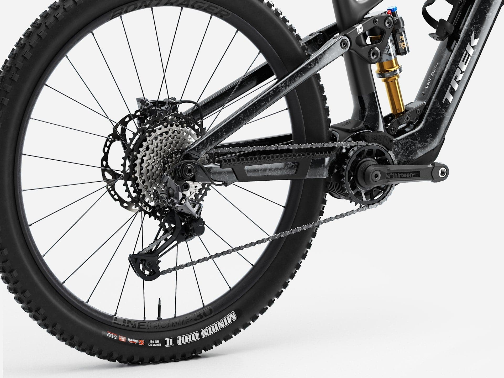 Trek Fuel+ EX 9.8 XT Gen 2 electric mountain bike with adjustable suspension, black frame, and rugged tires.