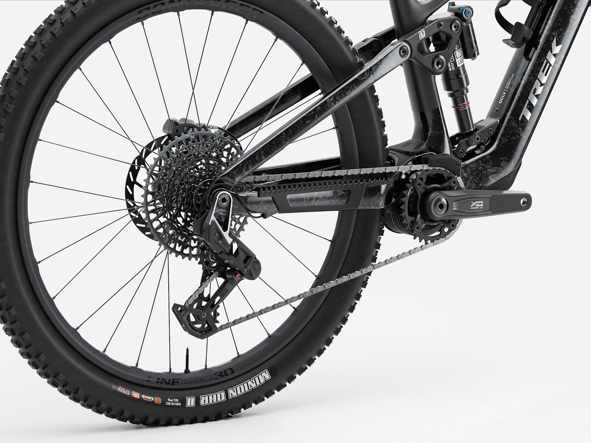 Trek Fuel+ EX 9.9 X0 AXS mountain bike with TQ HPR50 motor, SRAM X0 AXS shifters, shown in a trail riding setting