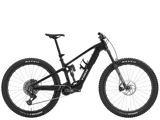 Trek Fuel+ EX 9.9 X0 AXS mountain bike with TQ HPR50 motor and SRAM X0 AXS gears, shown in a trail riding setup.