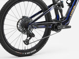 Trek Fuel+ EX 9.9 X0 AXS mountain bike with TQ HPR50 motor, SRAM X0 AXS shifters, shown in a trail riding position