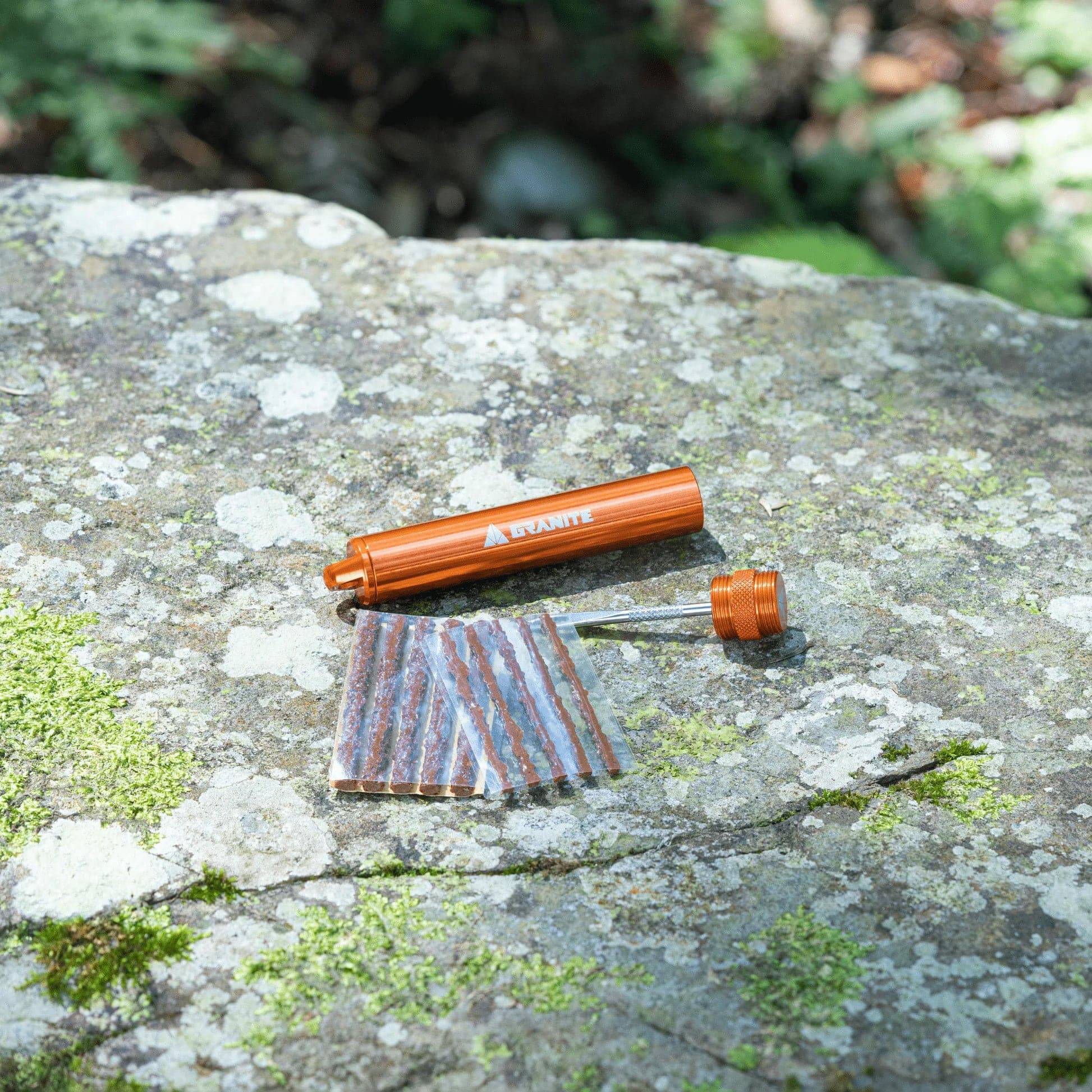 Granite Suture Tubeless Tyre Plug Kit with CO2 inflator for quick tire repairs, showing plugs and inflator components.
