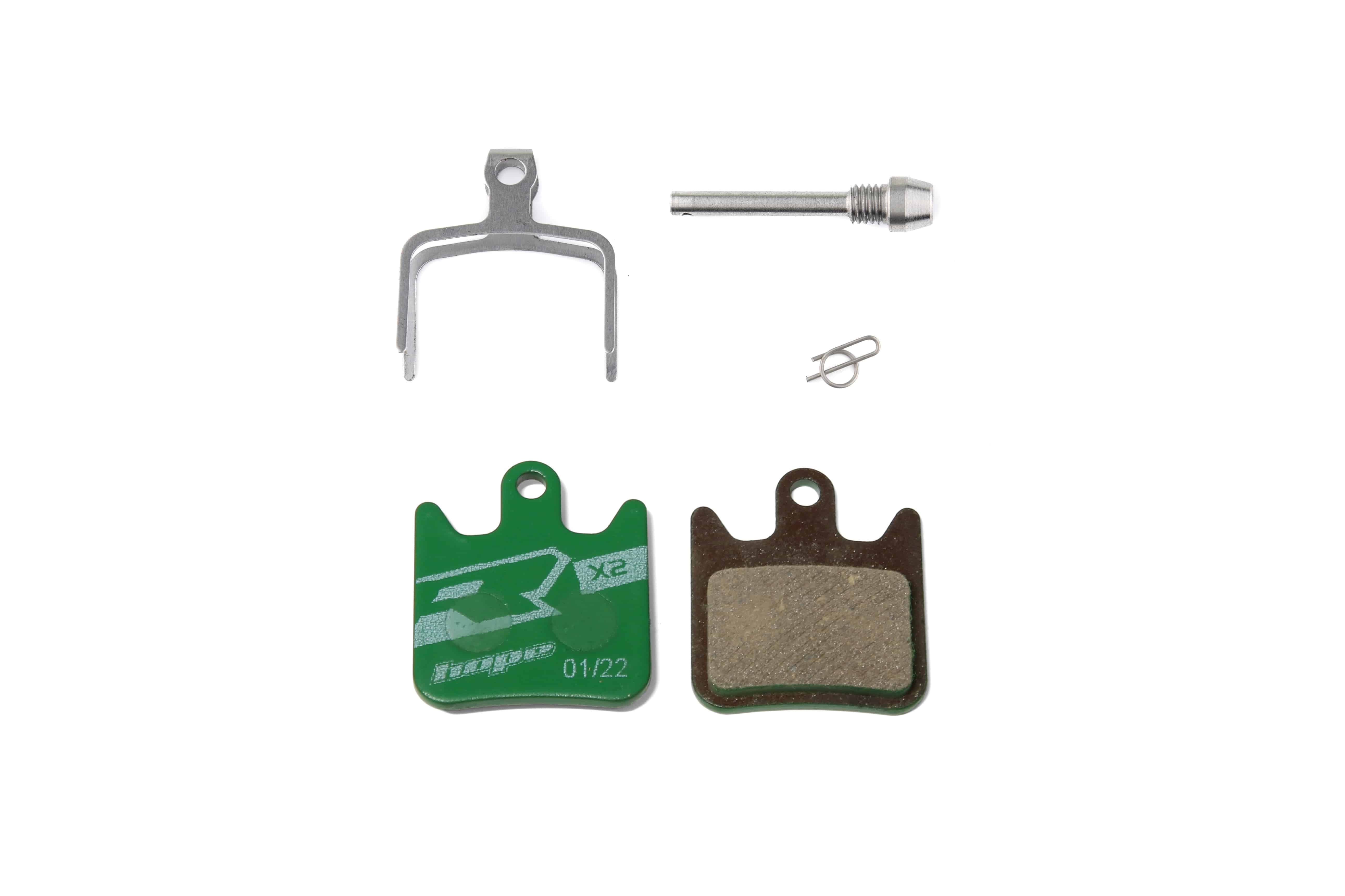 Hope Racing Green Disc Brake Pads for high-performance bicycle braking components, showcasing green brake pad material and mounting hardware.