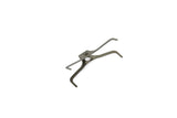 Hope V4 brake pad spring component for consistent braking performance and noise reduction, shown in the image.