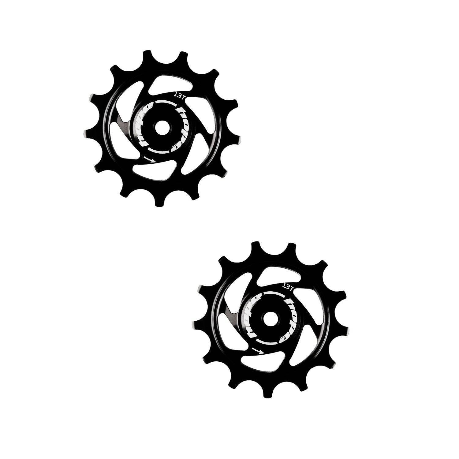 Hope 13-tooth jockey wheels for bicycle drivetrain, durable components designed to improve shifting efficiency and smooth gear operation.