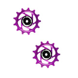 Hope 13-tooth jockey wheels for bicycle drivetrain, durable black components with silver bearings, designed to improve shifting performance.