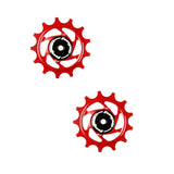 Hope 13-tooth jockey wheels for bicycle drivetrain, showing durable metal components and precise gear alignment.