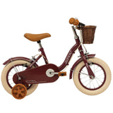 Huffy vintage 12-inch kids bike with removable stabilizers and front basket, featuring colorful frame and training wheels.