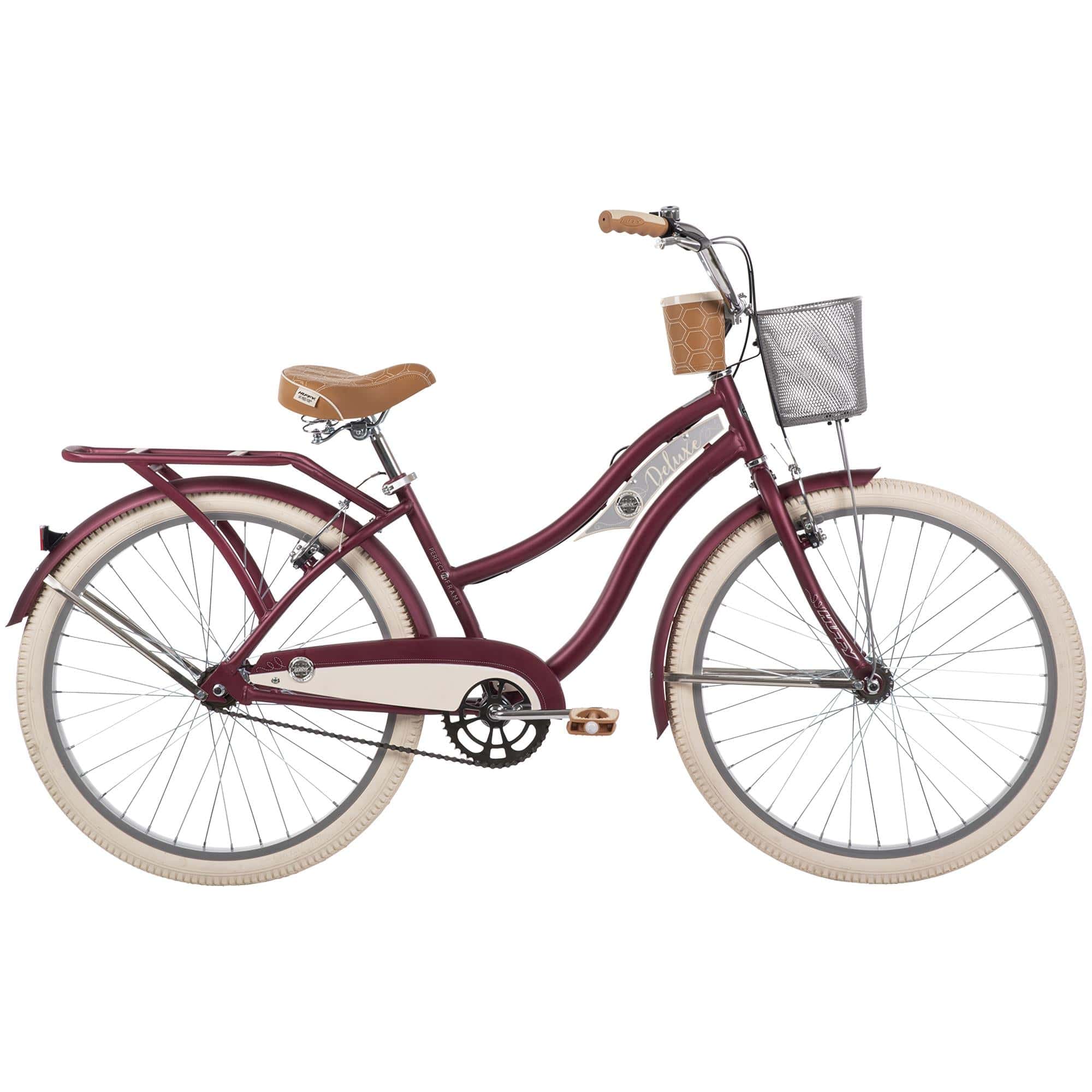 Huffy Deluxe Cruiser Bike 26-inch with basket, rear rack, and comfort features, shown in a classic cruiser style.