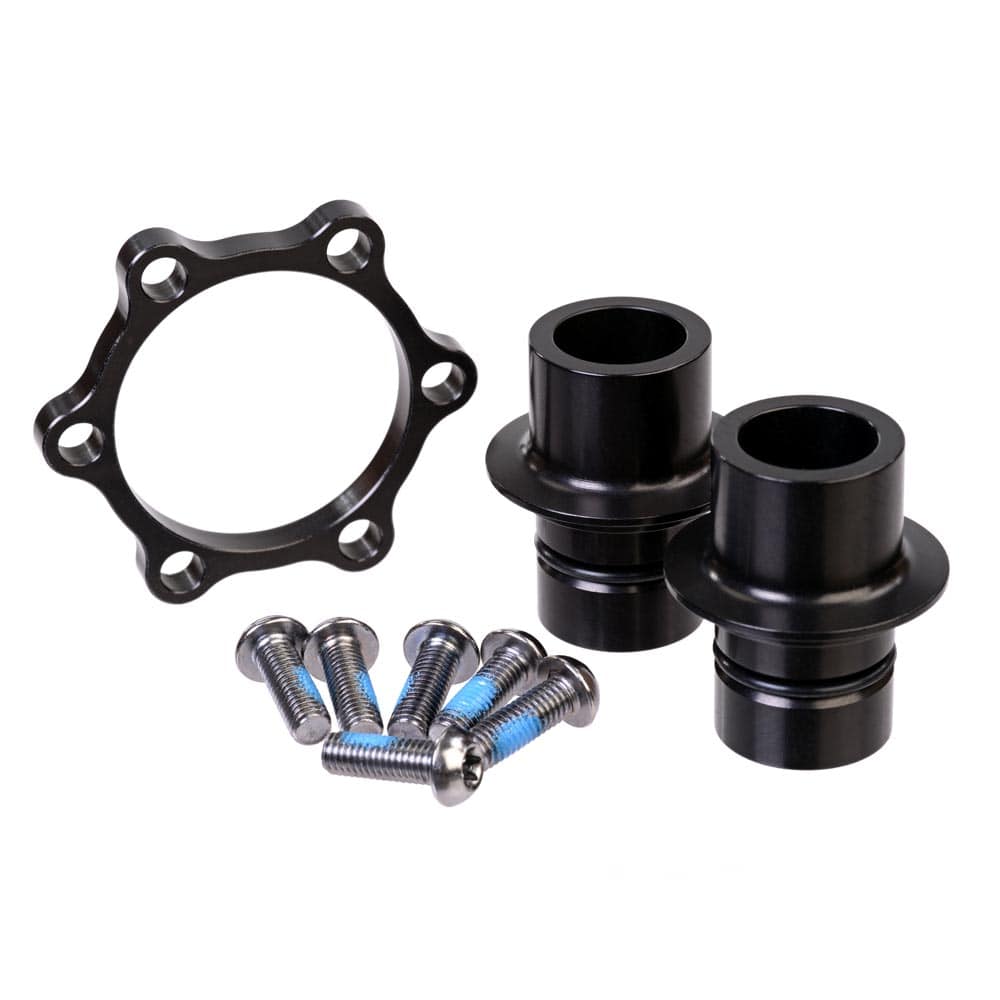 MRP Better Boost Adapter Kit for DT Swiss 240 OS 15x100mm hub components, showing the black and silver spacers and mounting hardware.