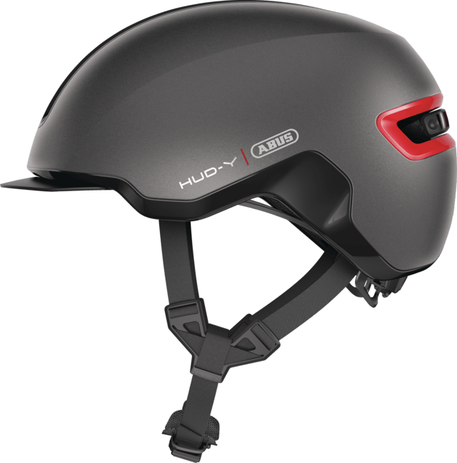 ABUS HUD-Y urban cycling helmet with rechargeable rear LED light, side view showing sleek design and safety features.