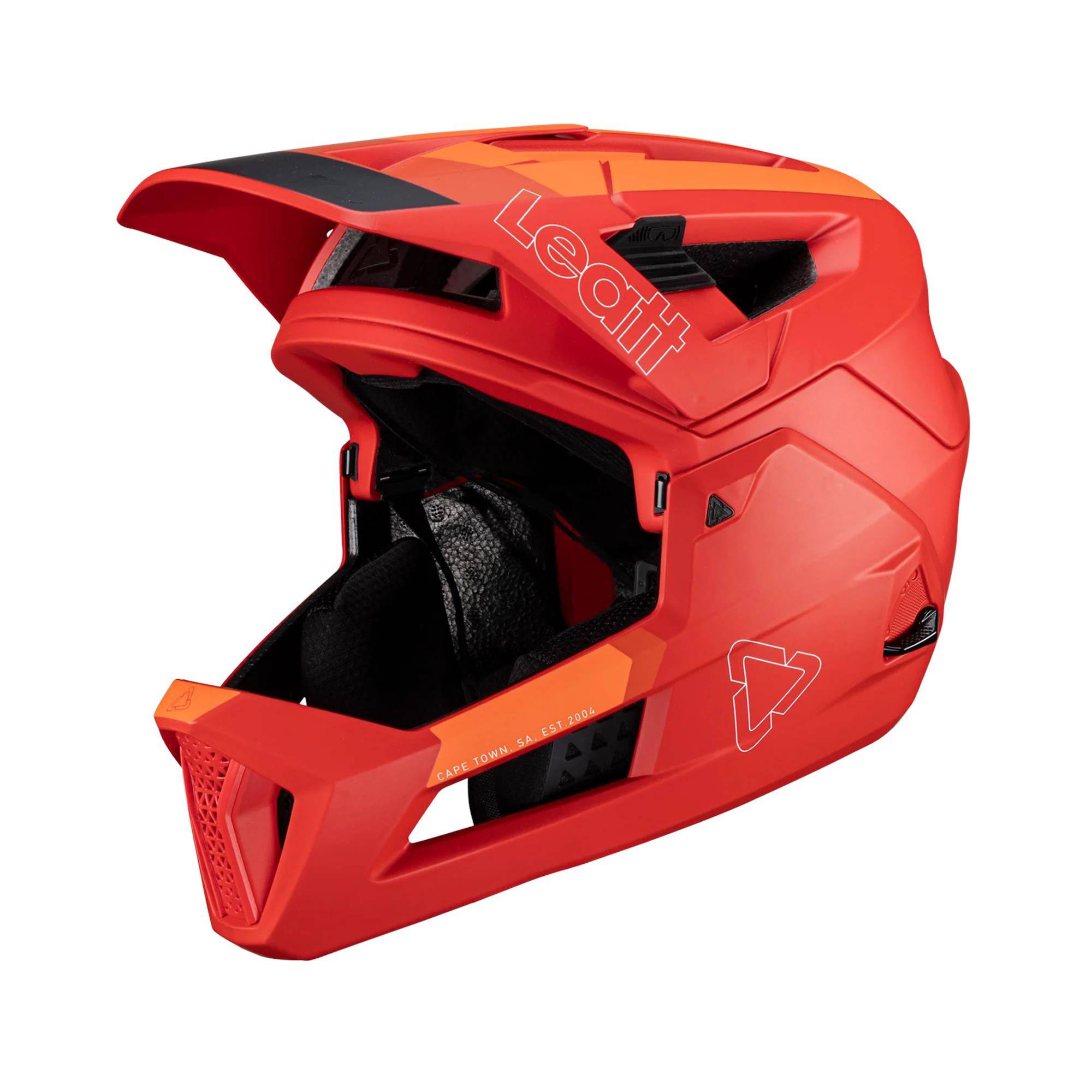 Leatt Enduro 4.0 MTB helmet with removable chin bar and 360° turbine technology, shown on a rider's head with vents and adjustable straps.
