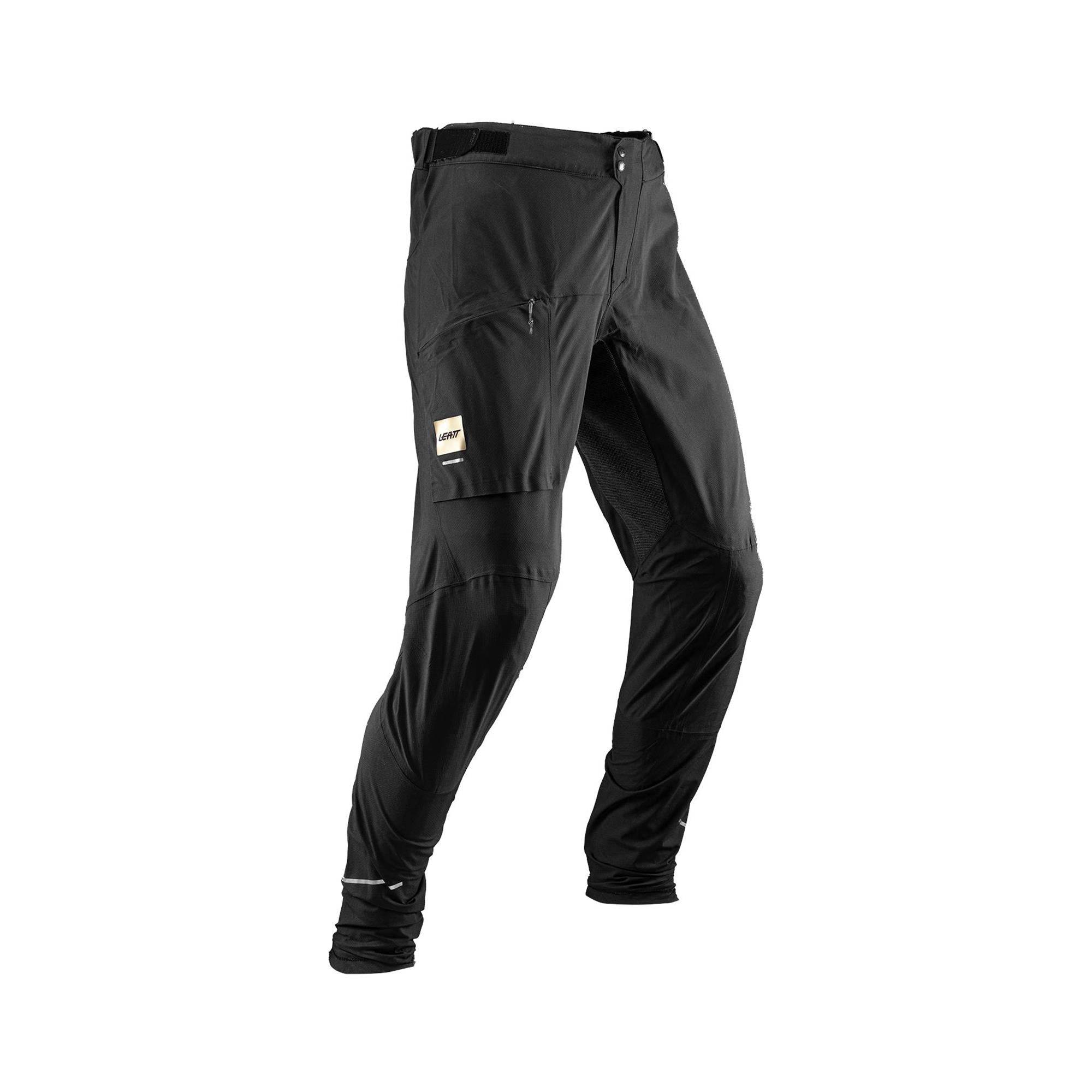 Leatt HydraDri 3.0 waterproof MTB pants with reinforced protection, shown in black with adjustable waistband and breathable fabric.