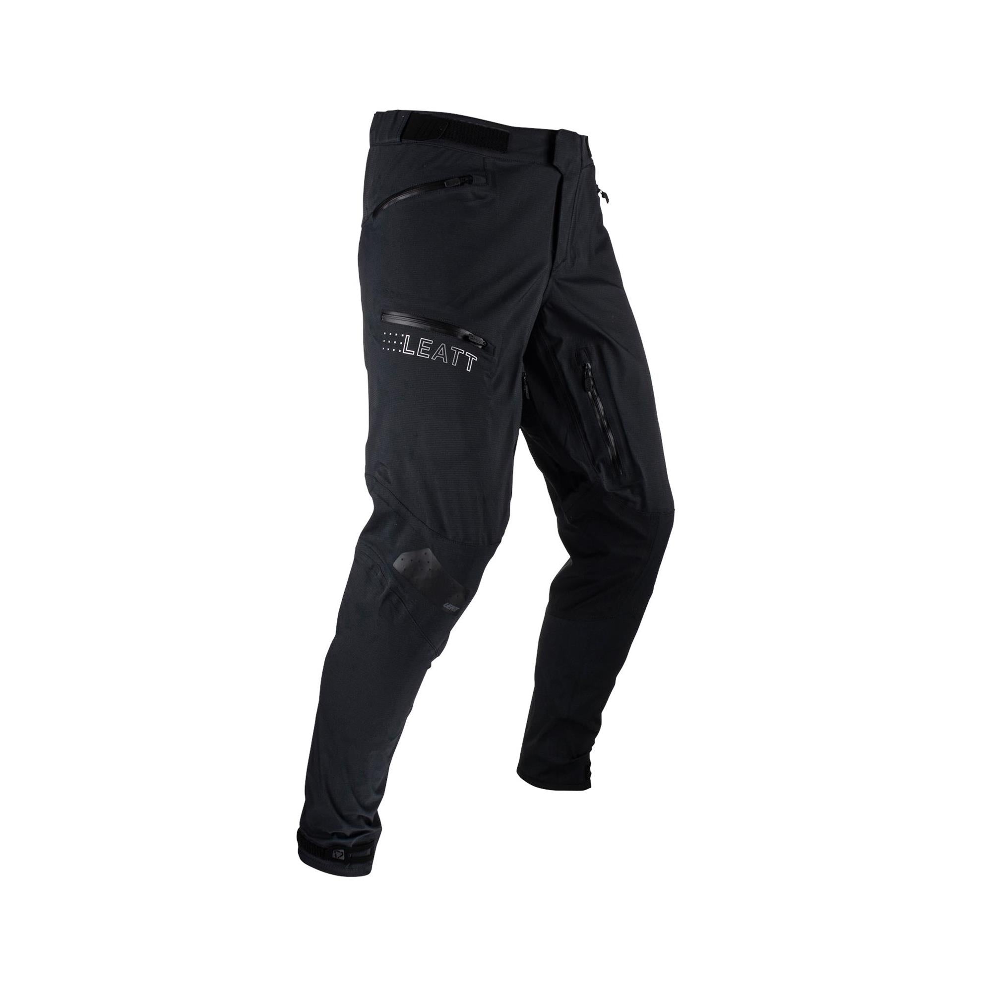 Leatt HydraDri 5.0 MTB waterproof and breathable mountain biking pants, black, with adjustable waist and reinforced knees.