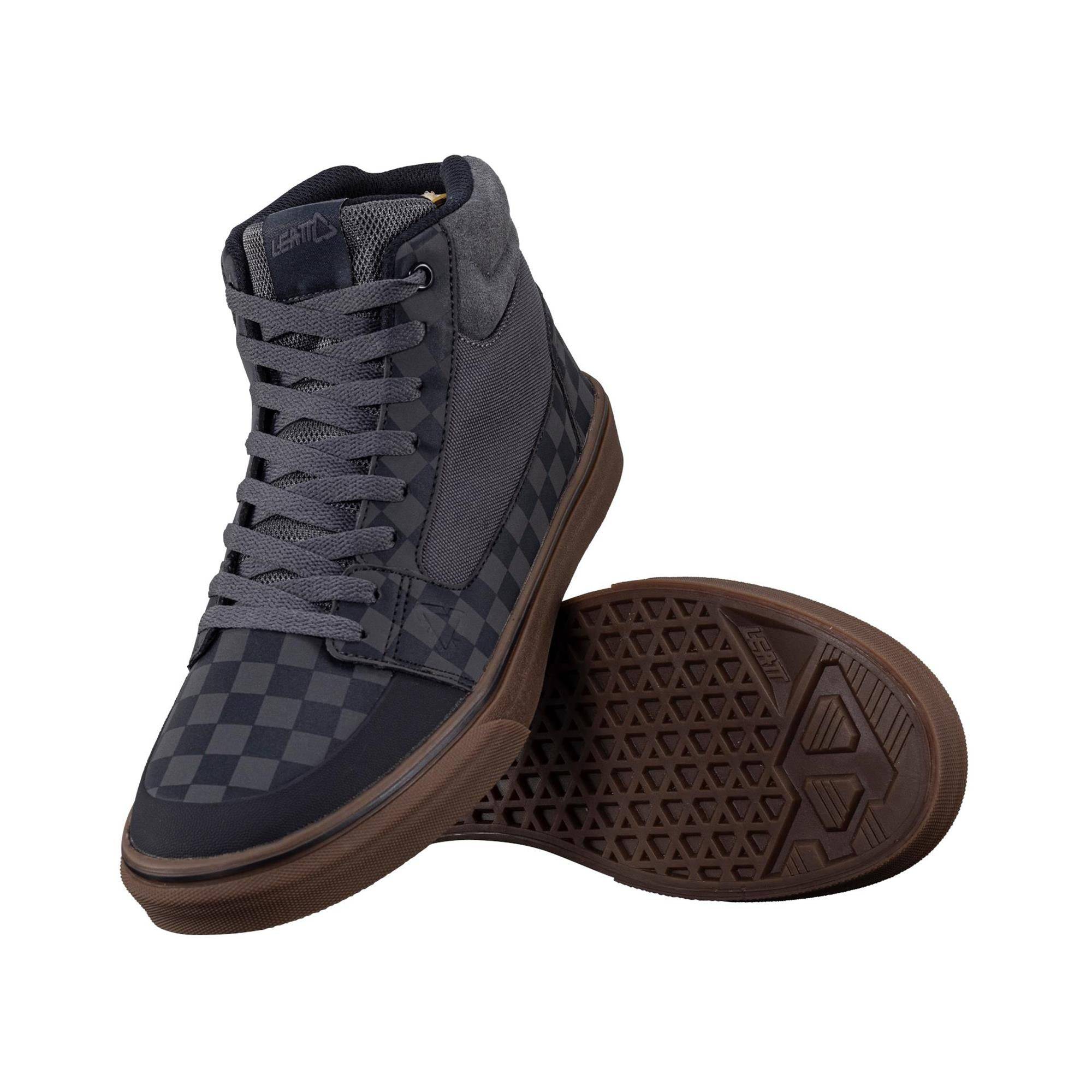 Leatt Hi Flat 1.0 MTB shoes with RideGrip™ sole for pedal support and comfort, shown in black with textured design.