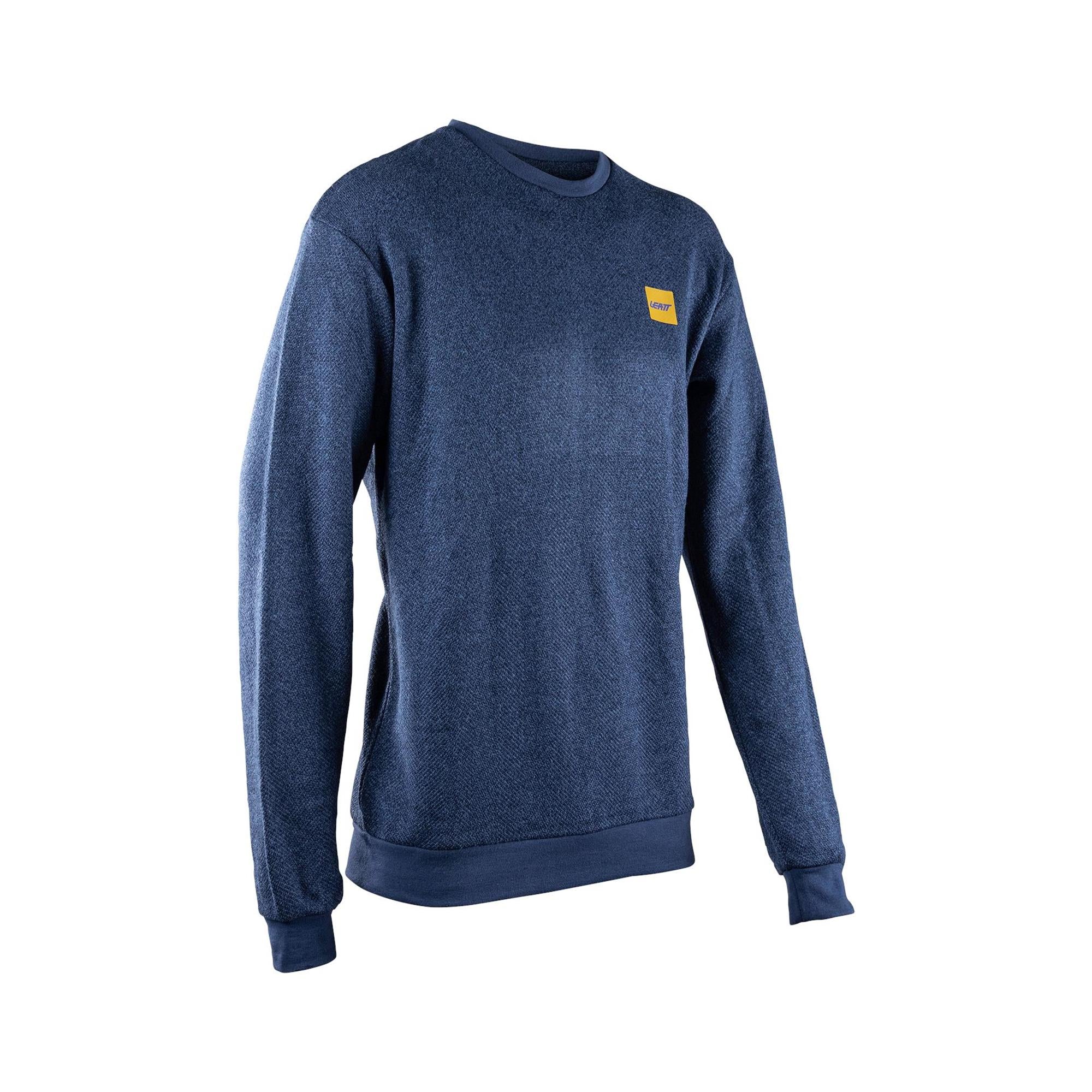 Leatt Tech Sweater 2026 unisex microfleece sweater with 4-way stretch, eco-friendly packaging visible in the image.