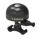 Lezyne Classic Brass Bike Bell in black with easy handlebar mount and clear sound, designed as a bike accessory.