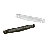 Lezyne Matrix tyre lever pair in black, durable bike puncture repair tools, shown in a workshop setting.