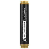 Lezyne Pro Tubeless Kit in black with tire plugs, valve core tool, and sealant accessories for road, mountain, and gravel bike repairs.