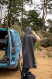 Madison DTE Men's Dirty Habit thermal changing robe in black, XS-XL size, outdoor wear, shown hanging on a hook.