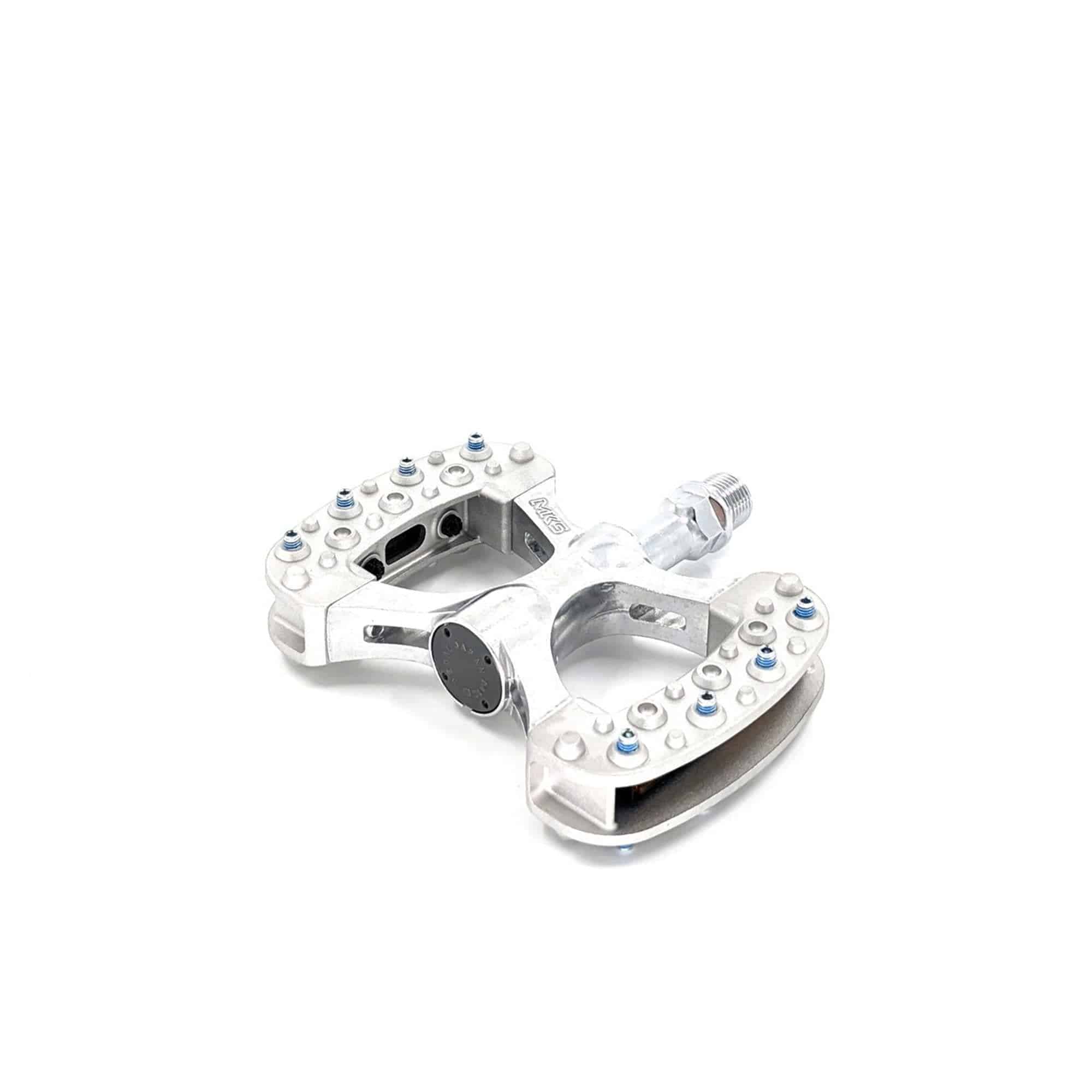 MKS Gamma gravel and mixed surface bike pedal with anti-slip grip pins, durable component for cycling.