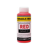 Bleedkit Red Mineral Brake Oil 100ml for Shimano hydraulic brake systems, showing the bottle with red liquid and packaging.