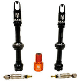 Maxxis MaxxOut tubeless valve kit with 50mm length, core remover, and adapter in black, for bicycle tubeless wheel setups.