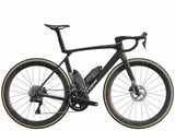 Trek Madone SLR 7 Gen 8 road bike with aero carbon frame and Shimano Ultegra Di2 gear shifters, shown from the side.