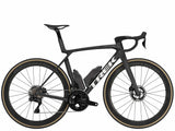 Trek Madone SLR 9 Gen 8 road bike with aerodynamic carbon frame and disc brakes, shown from the side with sleek design details