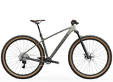Trek Marlin 6 Gen 3 mountain bike with a black frame and knobby tires, designed for trail and urban cycling.