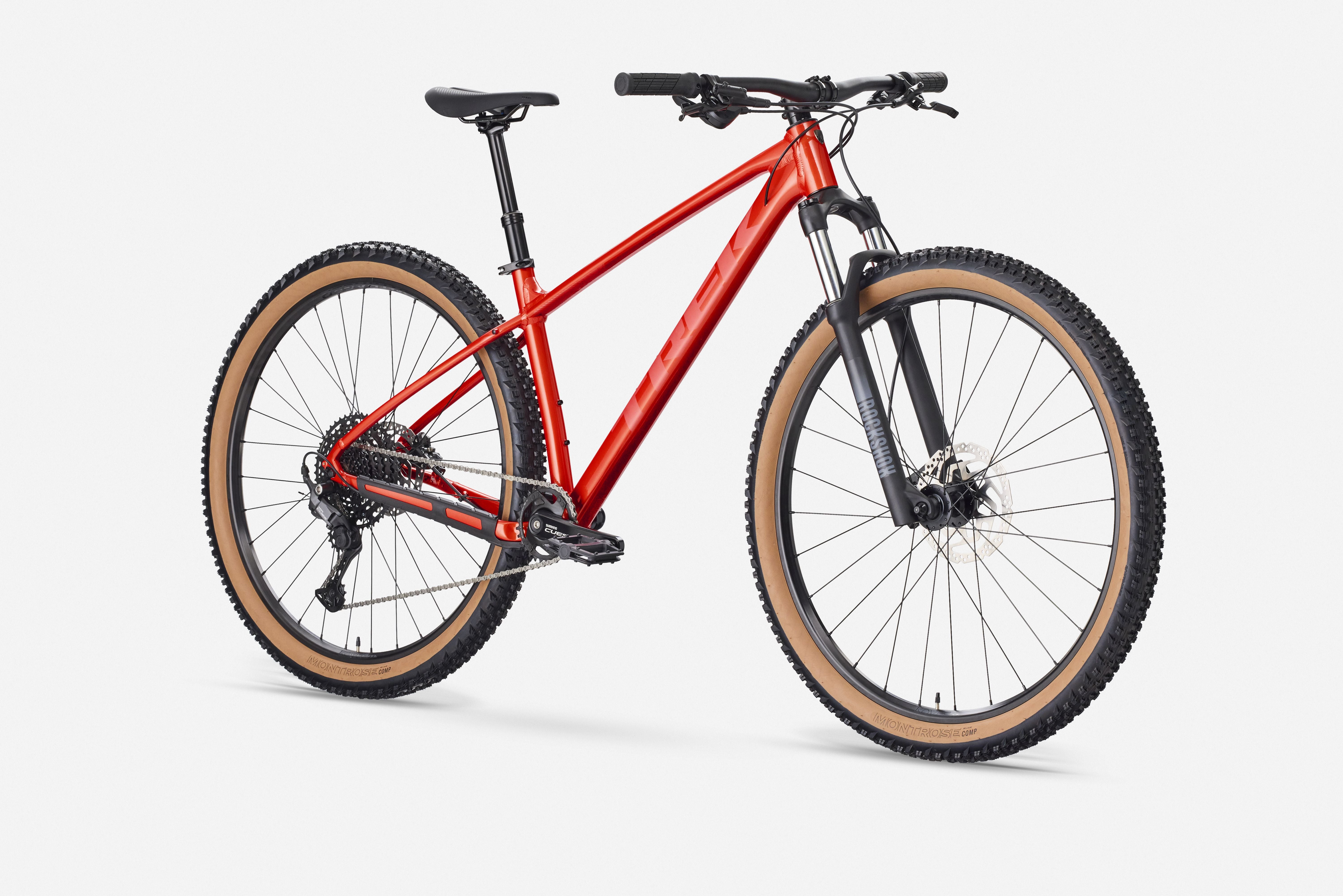 Trek Marlin 6 Gen 3 mountain bike with a sleek frame, knobby tires, and front suspension for trail and urban cycling.