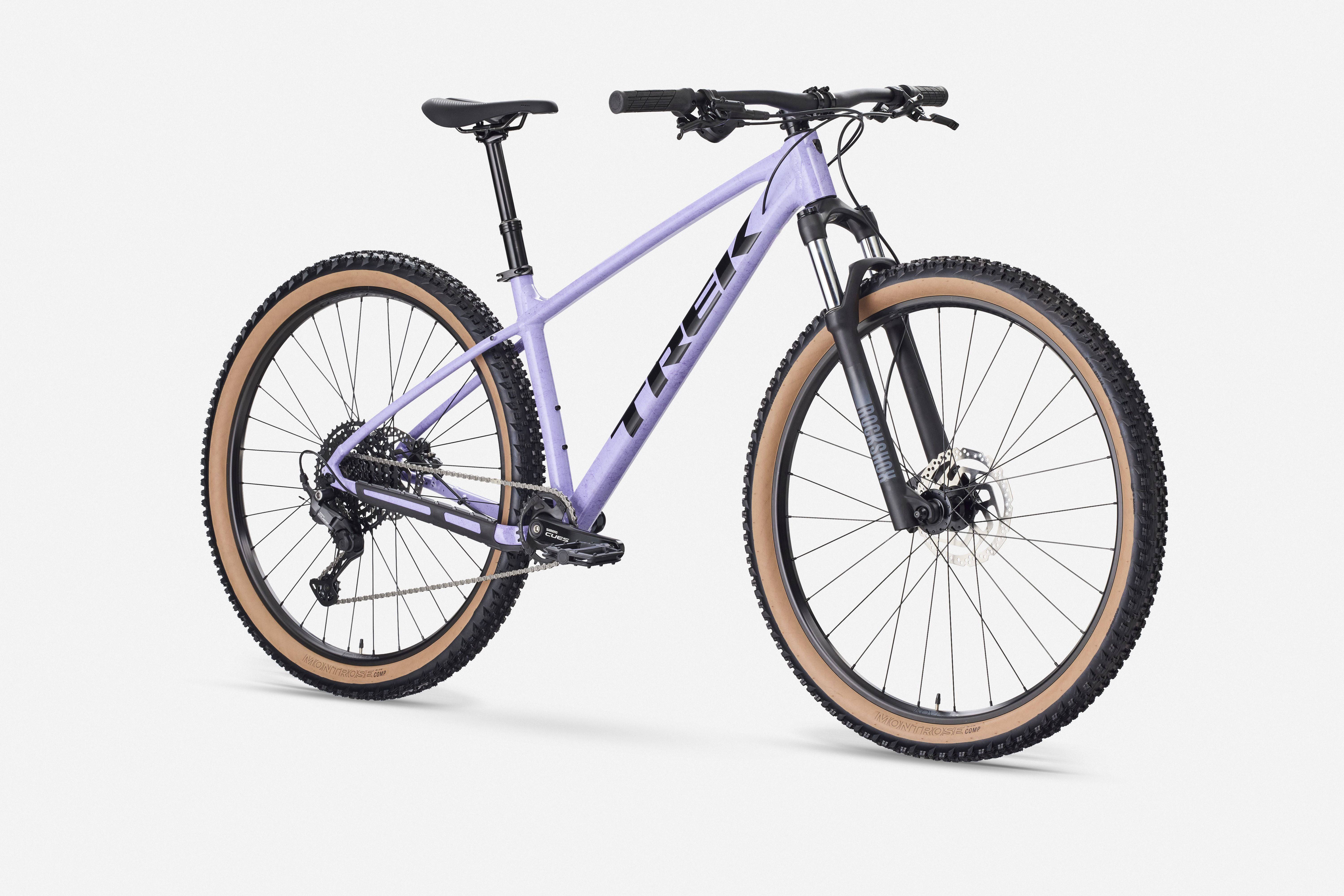 Trek Marlin 6 Gen 3 mountain bike with 26-inch wheels, black frame, and front suspension for trail and urban cycling.