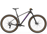Trek Marlin 7 Gen 3 mountain bike with black frame and suspension fork, designed for trail riding and outdoor adventures.