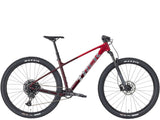 Trek Marlin 7 Gen 3 mountain bike with lightweight frame, front suspension, and knobby tires for trail riding and outdoor adventures.